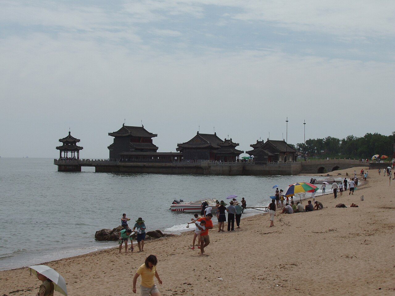 The Old Dragon’s Head pavilions at the sea’s edge, seen from the beach at Shanhaiguan